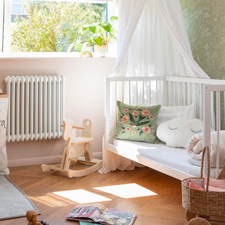 white cot bed converted to toddler bed 